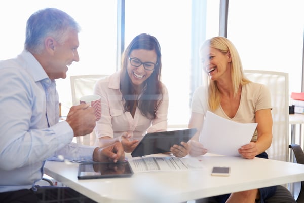 three people in meeting